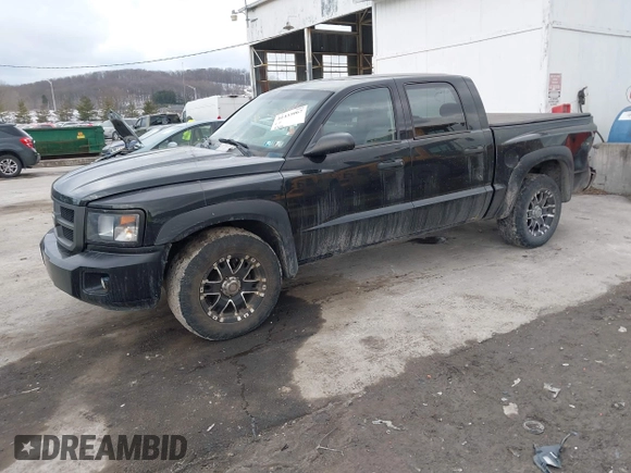 2011 Ram Dakota Bighorn/Lonestar with VIN 1D7RW3GK6BS611095, listed as a IAAI auction lot 41433067 with 137,638 mi miles. Bid and sale history available at carsss.com. Image 17.