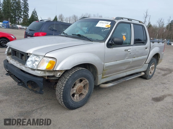 2003 Ford Explorer Sport Trac XLS z VIN 1FMZU77E93UA38468, wystawiony jako IAAI lot #41667956 z przebiegiem 291 806 mil mil oraz . Historia ofert i sprzedaży dostępna na DreamBid. Obrazek 2.