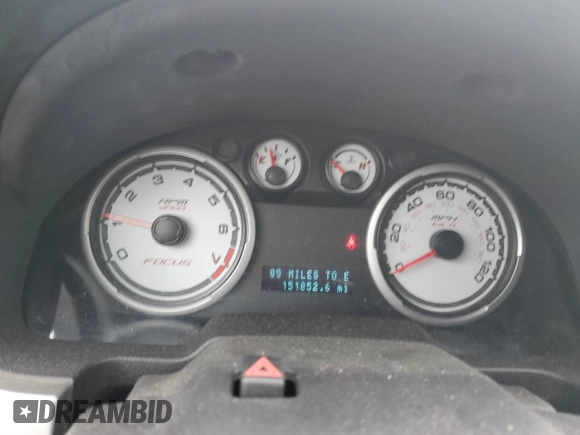 2008 Ford Focus SE z VIN 1FAHP33NX8W147139, wystawiony jako Copart lot #57520415 z przebiegiem 151 852 mil mil oraz Szkoda całkowita • Salvage title. Historia ofert i sprzedaży dostępna na DreamBid. Obrazek 9.