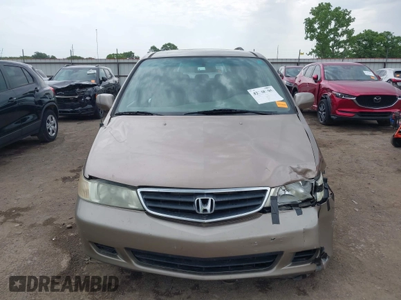 2003 Honda Odyssey EX-L z VIN 5FNRL18063B135949, wystawiony jako IAAI lot #42248105 z przebiegiem 210 567 mil mil oraz . Historia ofert i sprzedaży dostępna na DreamBid. Obrazek 12.
