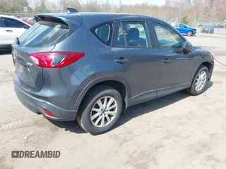 2013 Mazda CX-5 Sport with VIN JM3KE4BE7D0164398, listed as a IAAI auction lot 42107164 with 166,852 mi miles. Bid and sale history available at carsss.com. Image 4.