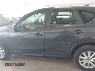 2014 Mazda CX-5 Sport with VIN JM3KE4BE5E0375360, listed as a IAAI auction lot 41788977 with 135,487 mi miles. Bid and sale history available at carsss.com. Image 14.
