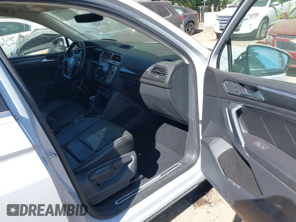 2018 Volkswagen Tiguan SEL Premium with VIN 3VV5B7AX5JM004713, listed as a IAAI auction lot 40498843 with 92,256 mi miles and . Bid and sale history available at DreamBid. Image 5.