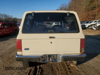 1987 Ford Bronco с VIN 1FMCU14T5HUD17428, выставлен на аукционе Copart как лот 84694904 с пробегом 25 356 миль миль и Чистый • Clean title. История ставок и продаж доступна на DreamBid. Изображение 6.