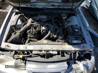 1997 Ford Thunderbird LX z VIN 1FALP62W2VH171912, wystawiony jako Copart lot #65073454 z przebiegiem 179 439 mil mil oraz Szkoda całkowita • Salvage title. Historia ofert i sprzedaży dostępna na DreamBid. Obrazek 11.