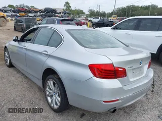 2015 BMW 5 Series 535i xDrive with VIN WBA5B3C54FD544802, listed as a IAAI auction lot 41283822 with 93,828 mi miles. Bid and sale history available at carsss.com. Image 3.