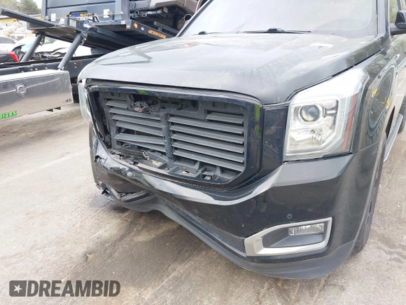 2017 GMC Yukon SLT with VIN 1GKS1BKC2HR128308, listed as a IAAI auction lot 41945770 with 158,905 mi miles. Bid and sale history available at carsss.com. Image 6.