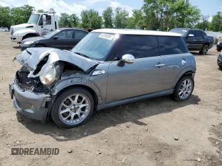 2007 MINI Hardtop S z VIN WMWMF73577TT84087, wystawiony jako Copart lot #60208895 z przebiegiem 76 248 mil mil oraz Szkoda całkowita • Salvage title. Historia ofert i sprzedaży dostępna na DreamBid. Obrazek 1.