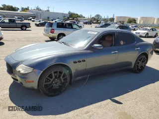 2006 Maserati Quattroporte z VIN ZAMCE39A760023369, wystawiony jako Copart lot #50000185 z przebiegiem 83 031 mil mil oraz Tytuł czysty. Historia ofert i sprzedaży dostępna na DreamBid. Obrazek 1.