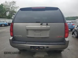 2007 GMC Yukon SLT with VIN 1GKFK13007J117446, listed as a Copart auction lot 55974665 with 204,785 mi miles and Salvage title. Bid and sale history available at DreamBid. Image 6.