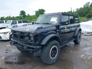 2021 Ford Bronco z VIN 1FMEE5DP2MLA89419, wystawiony jako IAAI lot #42346223 z przebiegiem Nie podano mil oraz . Historia ofert i sprzedaży dostępna na DreamBid. Obrazek 2.