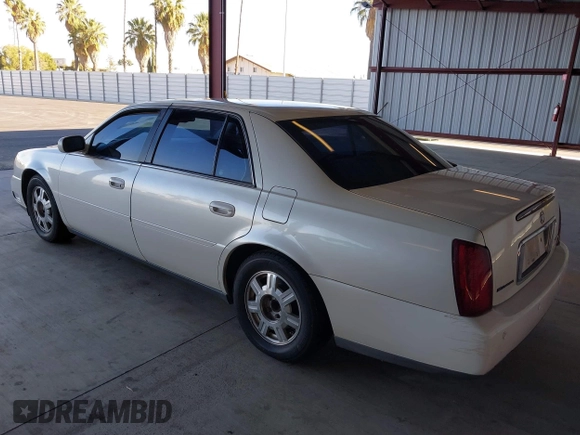 2003 Cadillac DeVille with VIN 1G6KD54Y83U252542, listed as a IAAI auction lot 40646979 with 131,202 mi miles. Bid and sale history available at carsss.com. Image 3.