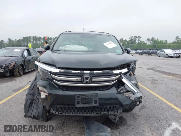 2017 Honda Pilot Touring with VIN 5FNYF6H93HB068846, listed as a IAAI auction lot 42083050 with 108,787 mi miles and . Bid and sale history available at DreamBid. Image 12.
