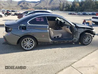 2015 BMW 2 Series 228i with VIN WBA1F5C50FV256459, listed as a Copart auction lot 56518723 with 65,653 mi miles. Bid and sale history available at carsss.com. Image 3.