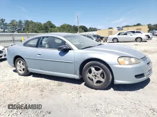 2004 Dodge Stratus SXT z VIN 4B3AG42G64E146011, wystawiony jako Copart lot #70186364 z przebiegiem 184 795 mil mil oraz Szkody całkowita. Historia ofert i sprzedaży dostępna na DreamBid. Obrazek 4.