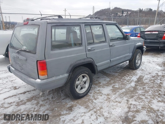 1999 Jeep Cherokee Sport with VIN 1J4FT68S1XL511195, listed as a IAAI auction lot 41651025 with Not provided miles and . Bid and sale history available at DreamBid. Image 4.