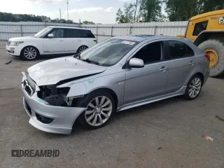 2010 Mitsubishi Lancer GTS z VIN JA32X8HW8AU010019, wystawiony jako Copart lot #52717965 z przebiegiem 142 659 mil mil oraz Szkoda całkowita • Salvage title. Historia ofert i sprzedaży dostępna na DreamBid. Obrazek 1.
