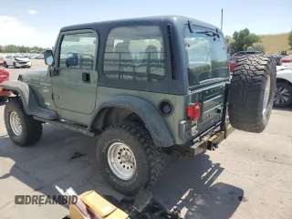 2000 Jeep Wrangler Sport с VIN 1J4FA49S4YP710633, выставлен на аукционе Copart как лот 65095875 с пробегом 107 613 миль миль и Чистый • Clean title. История ставок и продаж доступна на DreamBid. Изображение 2.