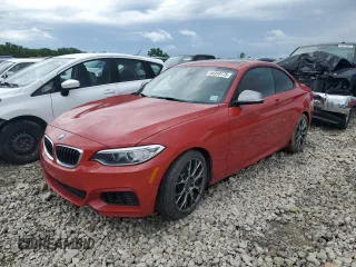 2016 BMW 2 Series M235i xDrive with VIN WBA1J9C5XGV696261, listed as a Copart auction lot 54910175 with 90,031 mi miles and Salvage title. Bid and sale history available at DreamBid. Image 1.