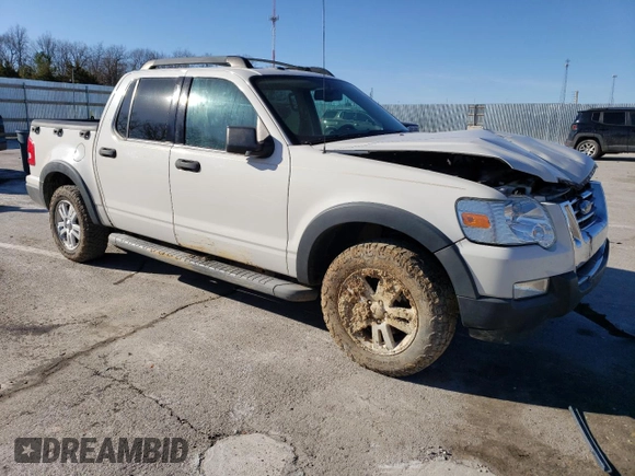 2010 Ford Explorer Sport Trac XLT z VIN 1FMEU3BE5AUA38530, wystawiony jako Copart lot #46987525 z przebiegiem 132 432 mil mil oraz Szkody całkowita. Historia ofert i sprzedaży dostępna na DreamBid. Obrazek 4.