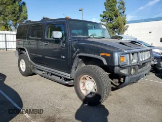 2003 Hummer H2 with VIN 5GRGN23U33H114928, listed as a Copart auction lot 78247874 with 290,954 mi miles and Clean Title. Bid and sale history available at carsss.com. Image 4.
