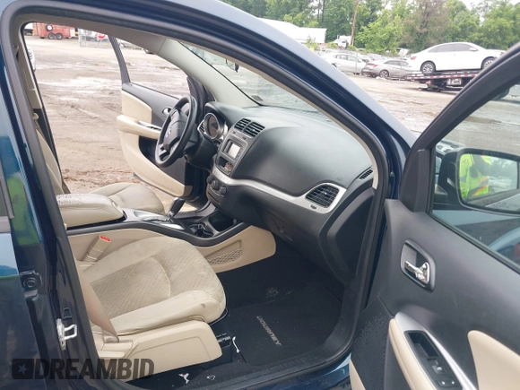 2014 Dodge Journey SXT z VIN 3C4PDCBG8ET126938, wystawiony jako IAAI lot #42526536 z przebiegiem 142 664 mil mil oraz . Historia ofert i sprzedaży dostępna na DreamBid. Obrazek 5.