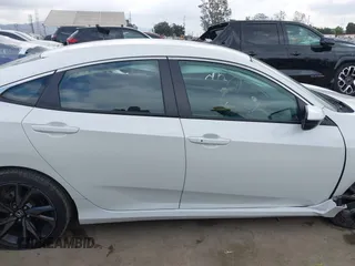 2019 Honda Civic Sport with VIN 19XFC2F82KE013269, listed as a IAAI auction lot 42118857 with 80,212 mi miles and . Bid and sale history available at DreamBid. Image 13.