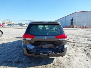 2014 Toyota Sienna L with VIN 5TDZK3DC3ES506658, listed as a IAAI auction lot 41469391 with 169,848 mi miles. Bid and sale history available at carsss.com. Image 16.