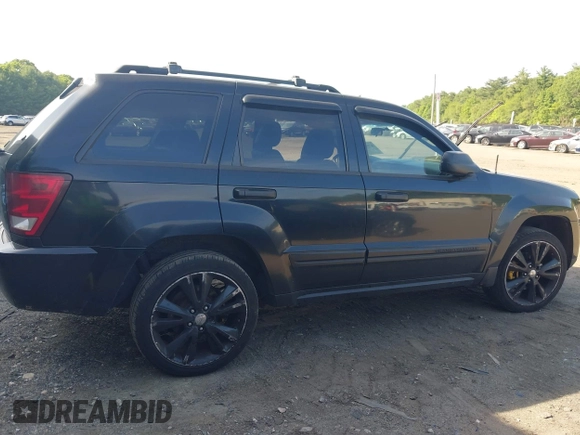 2005 Jeep Grand Cherokee Laredo z VIN 1J4GR48K65C725099, wystawiony jako IAAI lot #42509223 z przebiegiem 249 216 mil mil oraz . Historia ofert i sprzedaży dostępna na DreamBid. Obrazek 14.