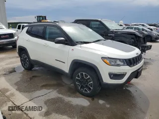 2019 Jeep Compass Trailhawk z VIN 3C4NJDDB5KT799401, wystawiony jako Copart lot #54770485 z przebiegiem 87 640 mil mil oraz Nie do naprawy • Non repairable. Historia ofert i sprzedaży dostępna na DreamBid. Obrazek 4.