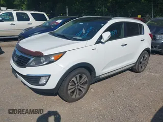 2013 Kia Sportage EX with VIN KNDPCCA22D7363985, listed as a IAAI auction lot 42621519 with 160,029 mi miles and . Bid and sale history available at DreamBid. Image 2.