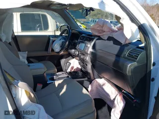 2019 Toyota 4Runner SR5 with VIN JTEBU5JR2K5641997, listed as a IAAI auction lot 41282350 with 102,476 mi miles. Bid and sale history available at carsss.com. Image 5.