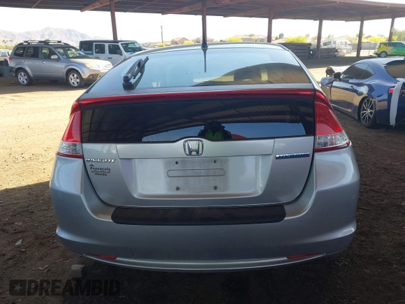 2010 Honda Insight LX z VIN JHMZE2H53AS007016, wystawiony jako IAAI lot #42096274 z przebiegiem 173 519 mil mil oraz . Historia ofert i sprzedaży dostępna na DreamBid. Obrazek 16.
