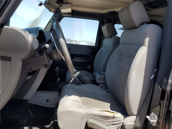2009 Jeep Wrangler Rubicon with VIN 1J4GA64179L703716, listed as a Copart auction lot 61084215 with 190,262 mi miles and Salvage title. Bid and sale history available at DreamBid. Image 7.