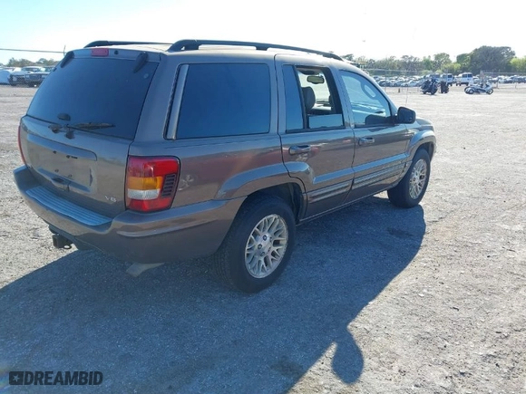 2002 Jeep Grand Cherokee Limited with VIN 1J8GW58N12C268589, listed as a IAAI auction lot 41748099 with 146,673 mi miles. Bid and sale history available at carsss.com. Image 4.