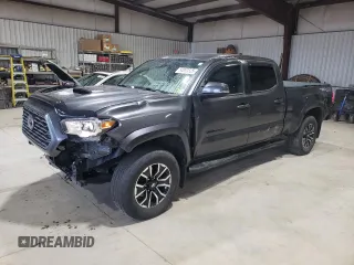 2020 Toyota Tacoma SR5 with VIN 3TMDZ5BN9LM092935, listed as a Copart auction lot 54083825 with 65,590 mi miles and Salvage title. Bid and sale history available at DreamBid. Image 1.