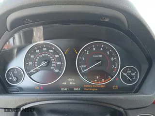 2015 BMW 4 Series 428i xDrive with VIN WBA3N5C58FK198825, listed as a IAAI auction lot 41919172 with 125,421 mi miles. Bid and sale history available at carsss.com. Image 7.
