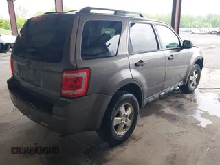 2009 Ford Escape XLS with VIN 1FMCU02759KC84959, listed as a IAAI auction lot 42219257 with 263,087 mi miles and . Bid and sale history available at DreamBid. Image 4.