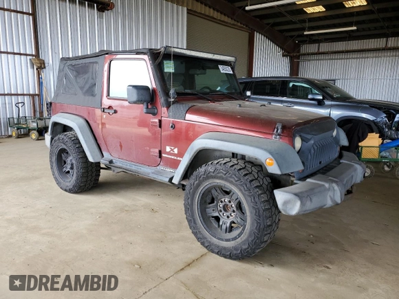 2008 Jeep Wrangler X with VIN 1J4FA241X8L541485, listed as a Copart auction lot 54050235 with 145,748 mi miles and Salvage title. Bid and sale history available at DreamBid. Image 4.