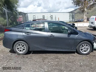 2020 Toyota Prius L Eco with VIN JTDKARFU8L3114786, listed as a IAAI auction lot 41804909 with 196,099 mi miles. Bid and sale history available at carsss.com. Image 13.