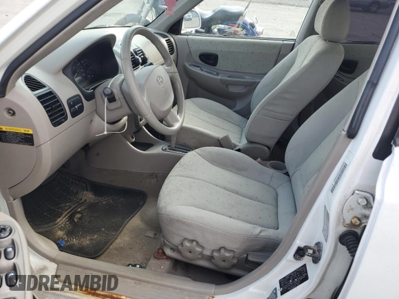 2005 Hyundai Accent GLS with VIN KMHCG45CX5U640554, listed as a Copart auction lot 77653664 with 179,642 mi miles and Clean Title. Bid and sale history available at carsss.com. Image 7.