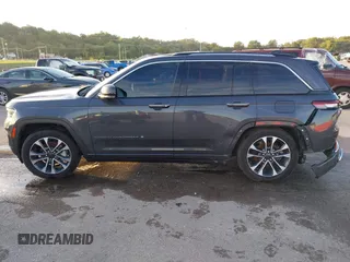 2023 Jeep Grand Cherokee Overland with VIN 1C4RJHDGXP8864365, listed as a IAAI auction lot 40502141 with 3,911 mi miles and . Bid and sale history available at DreamBid. Image 14.