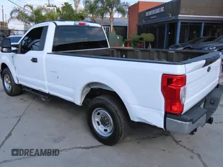 2022 Ford F-350 XL with VIN 1FTRF3A66NEG41366, listed as a Copart auction lot 63850985 with 34,356 mi miles and Salvage title. Bid and sale history available at DreamBid. Image 4.