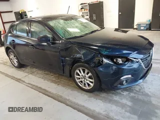 2016 Mazda 3 i Touring with VIN JM1BM1L71G1343674, listed as a IAAI auction lot 41630218 with 70,052 mi miles and . Bid and sale history available at DreamBid. Image 1.