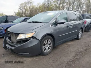 2014 Honda Odyssey EX-L with VIN 5FNRL5H63EB033684, listed as a IAAI auction lot 42025249 with 128,017 mi miles and . Bid and sale history available at carsss.com. Image 2.