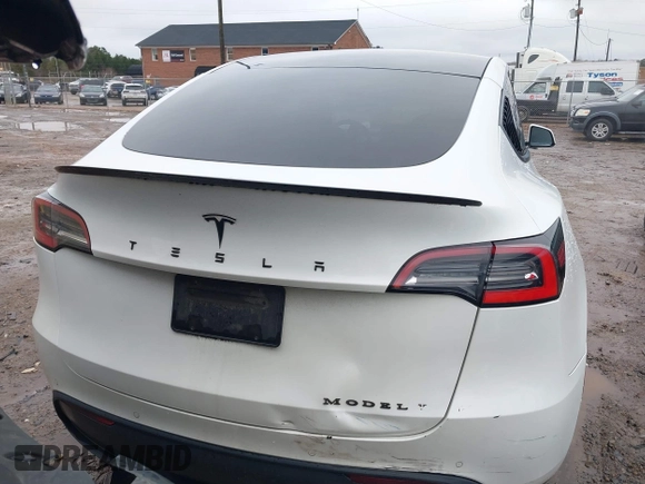 2021 Tesla Model Y Standard Range with VIN 5YJYGDED8MF114076, listed as a IAAI auction lot 41567295 with 150,133 mi miles and . Bid and sale history available at DreamBid. Image 15.