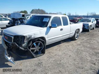 2000 GMC Sierra 1500 SLT with VIN 1GTEC19T6YZ129383, listed as a IAAI auction lot 41316141 with 187,146 mi miles. Bid and sale history available at carsss.com. Image 2.