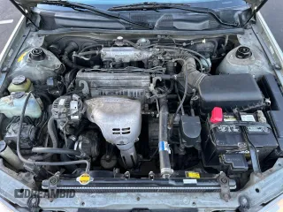 2000 Toyota Camry CE z VIN 4T1BG22K2YU669871, wystawiony jako Copart lot #57918075 z przebiegiem 164 842 mil mil oraz Czysty tytuł • Clean title. Historia ofert i sprzedaży dostępna na DreamBid. Obrazek 7.