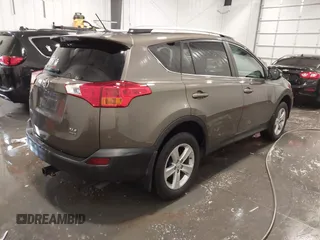 2013 Toyota RAV4 XLE with VIN 2T3RFREV0DW039560, listed as a IAAI auction lot 42344904 with 153,774 mi miles and . Bid and sale history available at DreamBid. Image 4.