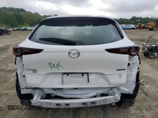 2021 Mazda CX-30 S with VIN 3MVDMBAL4MM219507, listed as a Copart auction lot 55579865 with 53,707 mi miles and Salvage title. Bid and sale history available at DreamBid. Image 6.
